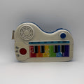 Baby Einstein Flip & Riff Keytar · guitar and piano