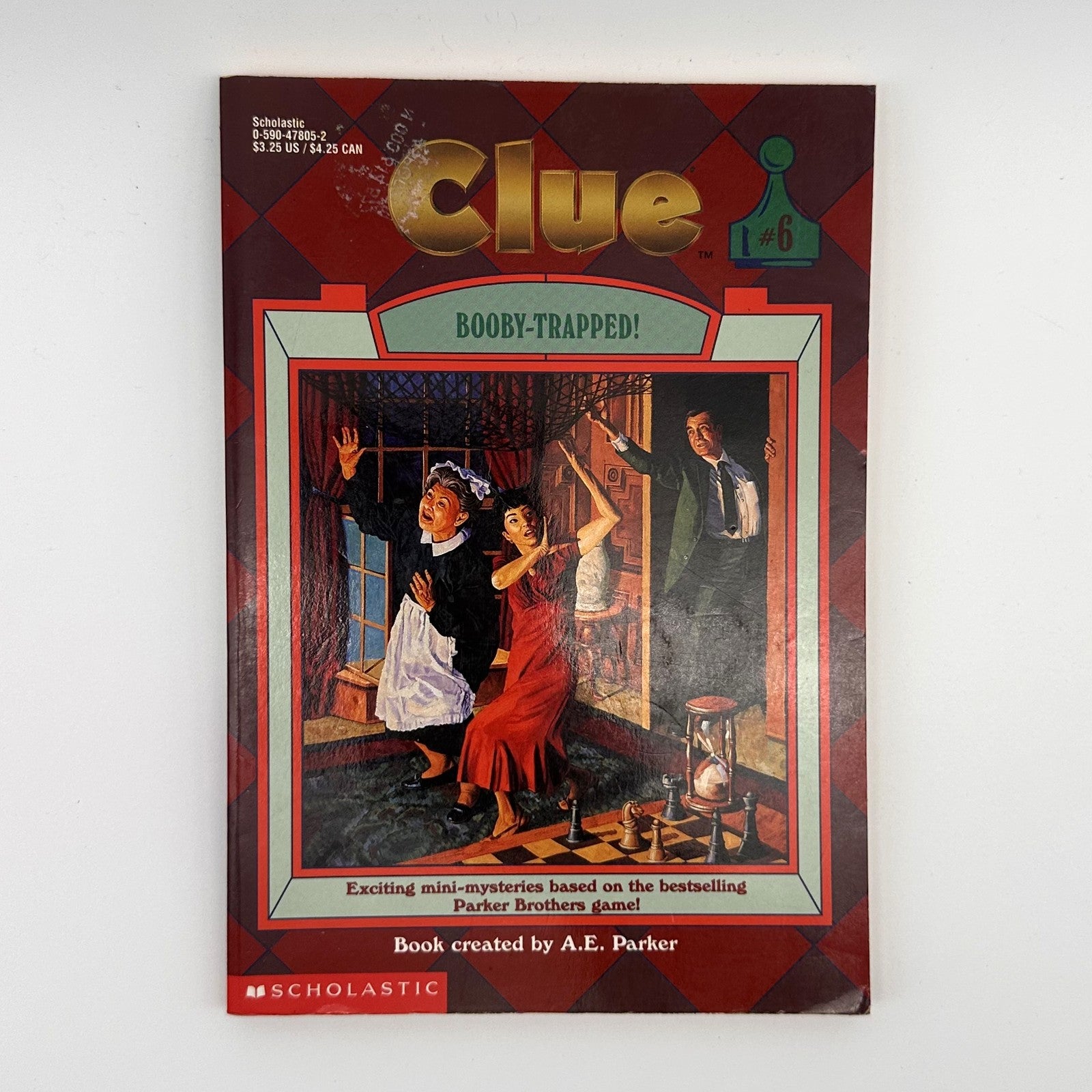 Clue #6: Booby-Trapped! · vintage Scholastic (1990s)
