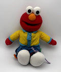 Learn to Dress Elmo · zips, laces & buttons