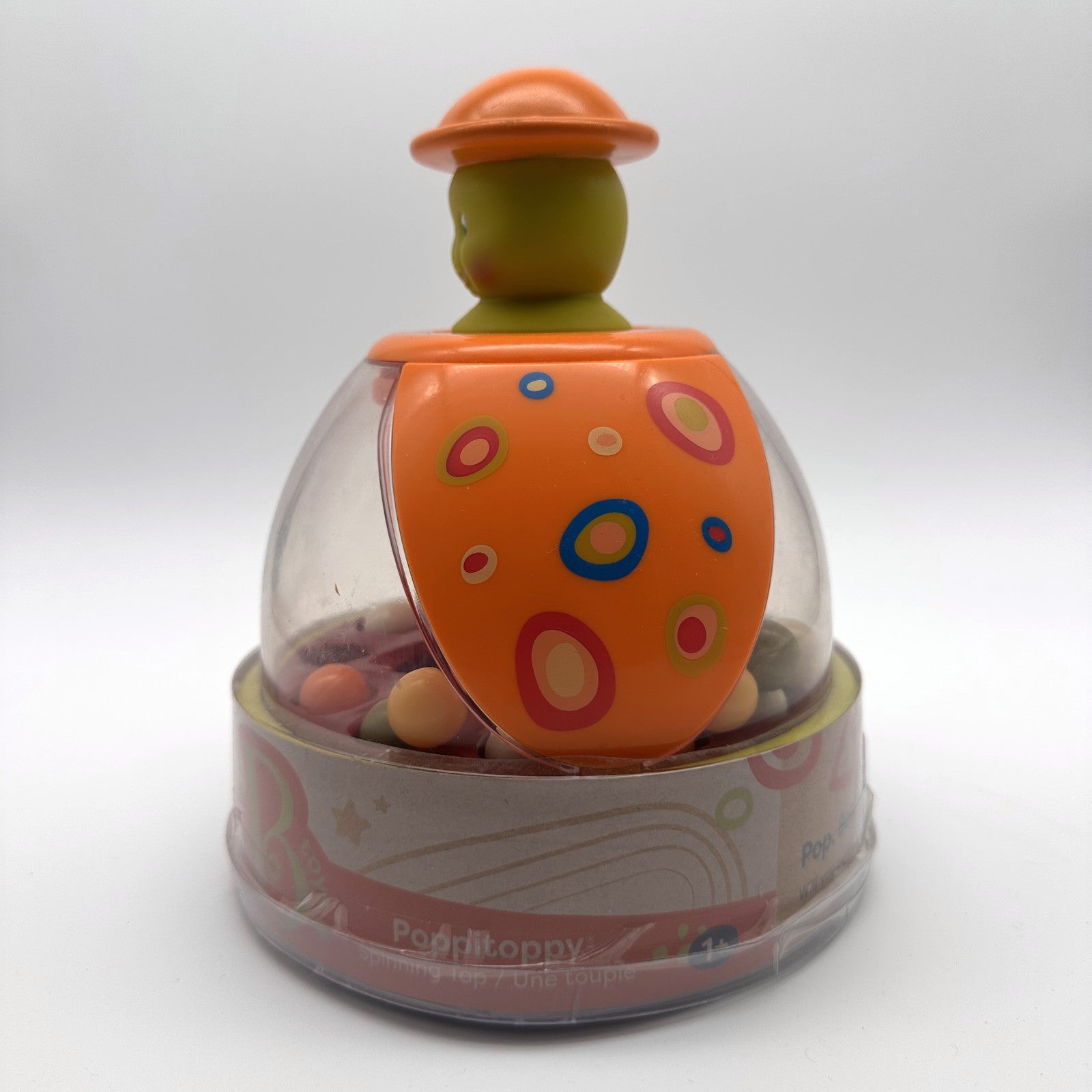 B. toys Poppitoppy Pop-Up Dome Spinner