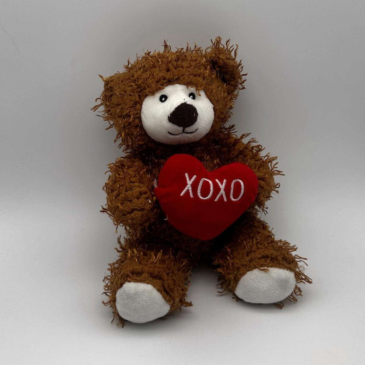 XOXO Heart Teddy · shaggy brown bear