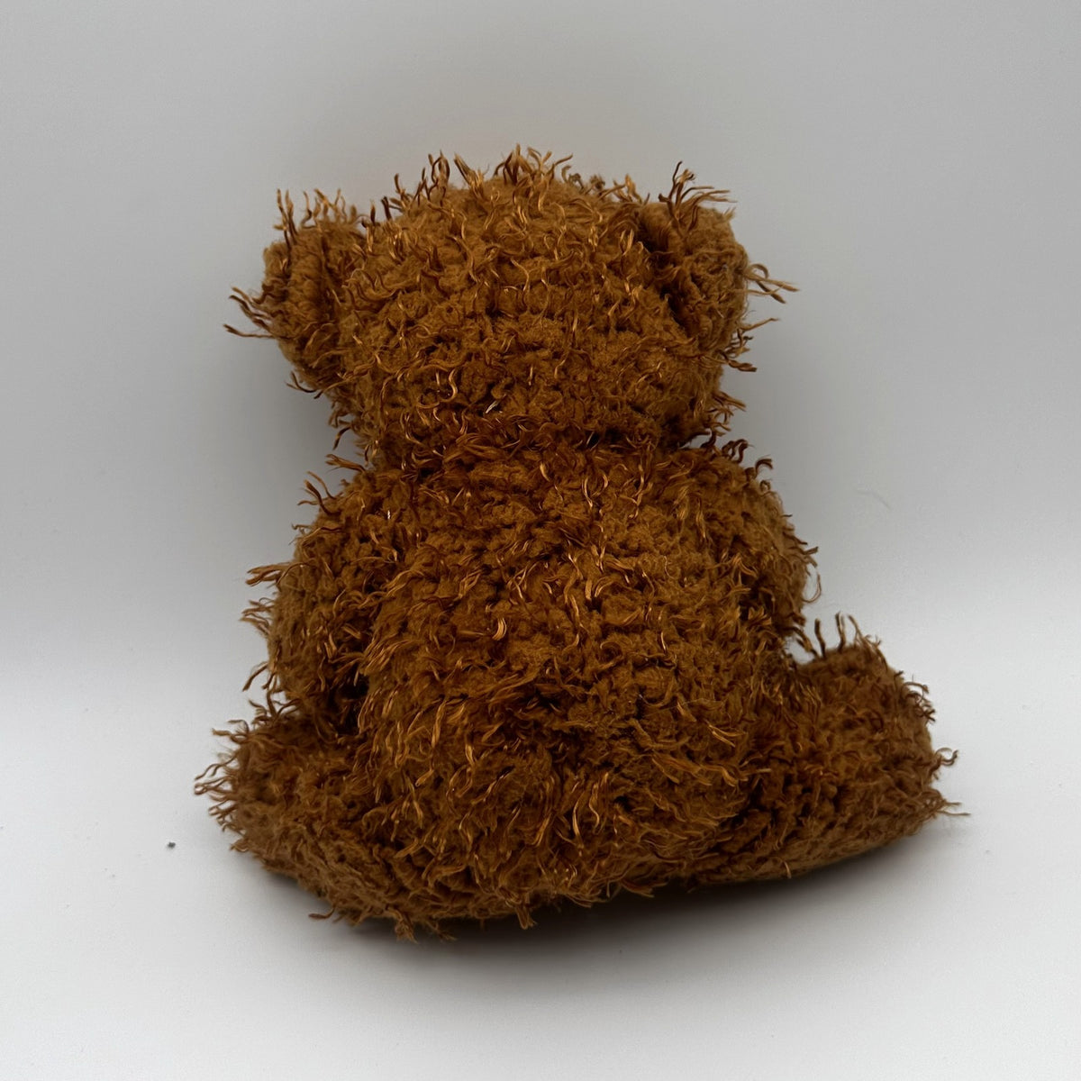 XOXO Heart Teddy · shaggy brown bear